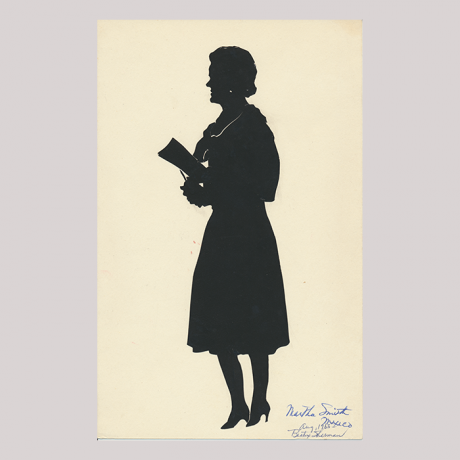 
        Front of silhouette, with woman looking left, wearing a skirt, signed by the artist in the right-hand corner.